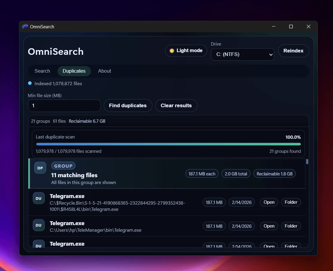 OmniSearch 重复文件查找界面，展示分组结果和可释放空间